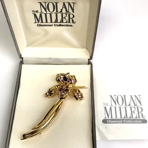 Joyería de la colección Glamour de Nolan Miller - alfiler de iris dorado y púrpura, broche floral - Imagen 1 de 7