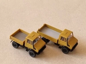 Wiking 1/87 MB Unimog U1700 Konvolut mit zwei Modellen in braungelb/ schwarz - Bild 1 von 4