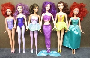 Konvolut 6 Modepuppen - Arielle, Barbie, Belle, Teresa, Fairytopia Disney - Bild 1 von 1