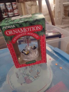 NOMA 1989 Ornamotion CHRISTMAS ORNAMENT Motion PENGUIN PLAYMATES Vintage NEW. - Picture 1 of 8