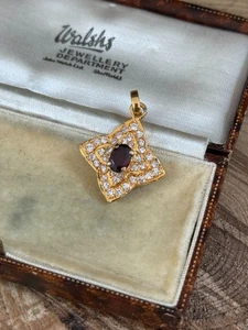 Vintage Red Garnet Pendant Gold Tone Metal Sparky Paste Rhinestone Trim Star - Picture 1 of 8