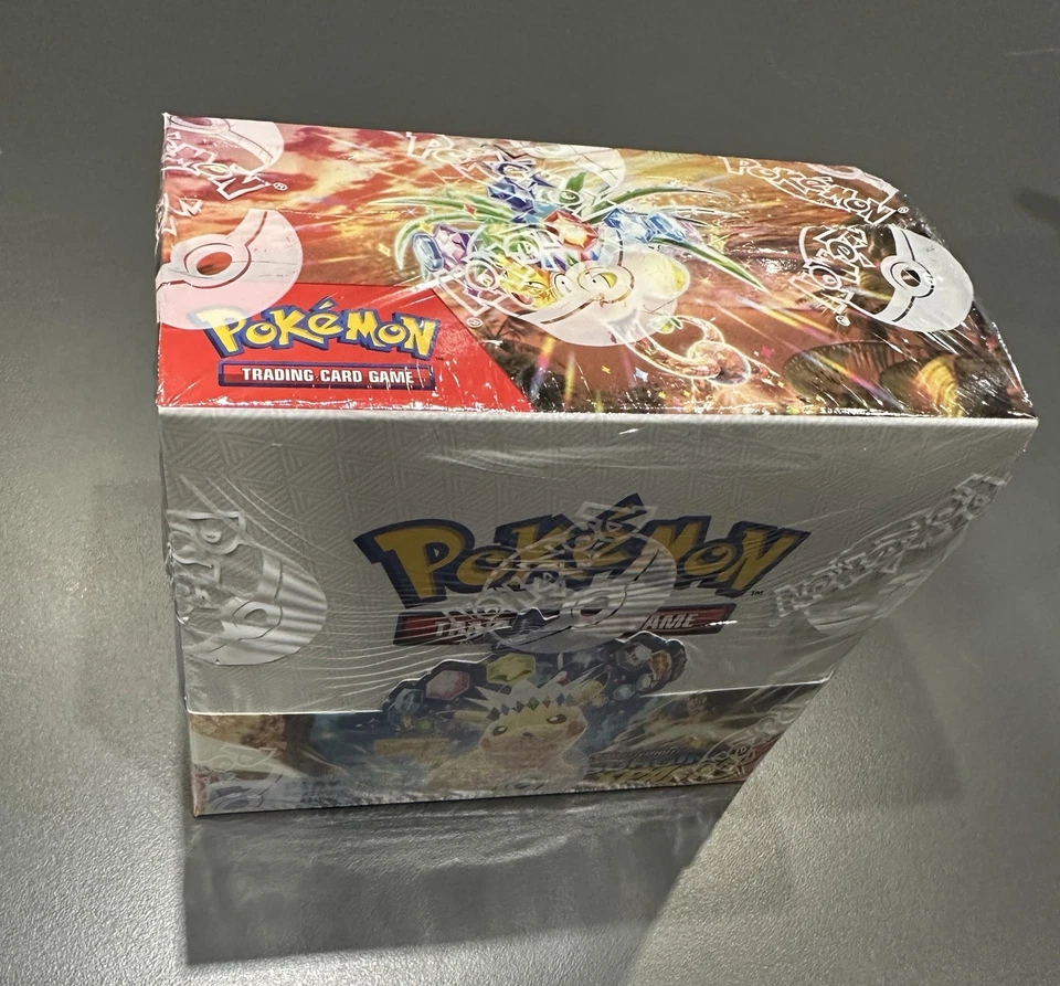 1x Pokemon Surging Sparks Caja de refuerzo sellada Exhibición Inglés Nuevo y EMBALAJE ORIGINAL - Imagen 1 de 1