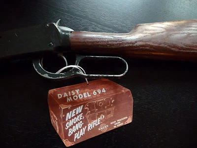  Daisy 694 Smoke, Bang, Play Rifle, StrongBox Hang Tag Reproducción -Rogers, AK Foto 1 de 4