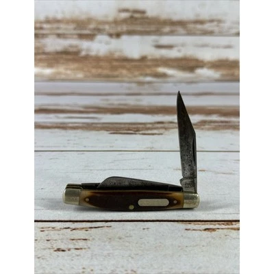 Cuchillo SCHRADE OLD TIMER EE. UU. CORTE SIERRA MANGOS DELRIN HOJAS DE ACERO AL CARBONO DE COLECCIÓN Foto 1 de 3