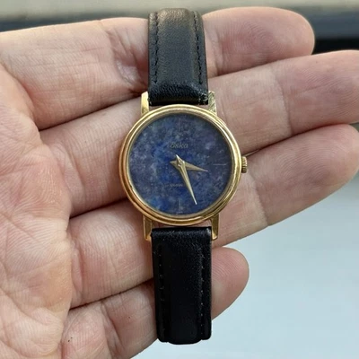 Reloj Eska vintage de cuarzo chapado en oro para dama esfera de piedra lapislázuli 24 mm para mujer Foto 1 de 4