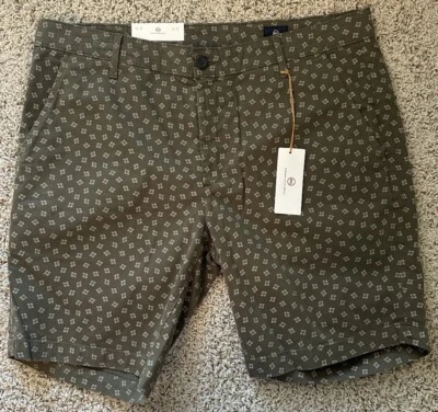 Pantalones Cortos Para Hombres AG Adriano Goldschmied "Griffin" Frente Plano Flora Canyon Moss EE. UU. 36 Foto 1 de 3