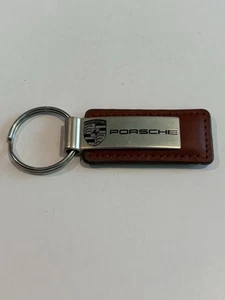 NICE🇺🇸VINTAGE”PORSCHE”DEALERSHIP/NORTH SCOTTSDALE BROWN/KEYCHAIN/RING/FOB/👀 - Picture 1 of 6