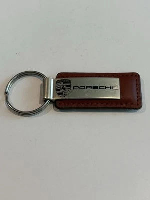 NICE🇺🇸VINTAGE”PORSCHE”DEALERSHIP/NORTH SCOTTSDALE BROWN/KEYCHAIN/RING/FOB/👀 - Image 1 of 4