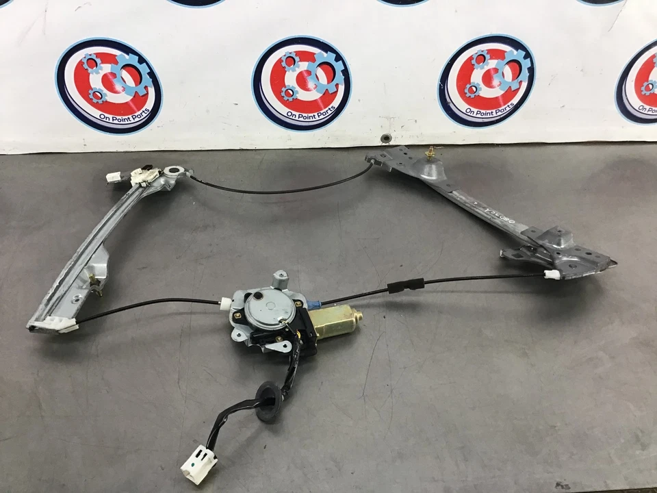 Двигатель регулятора левого окна 2006 Nissan 350Z 80731 от оригинального производителя 12BD7CA - Изображение 1 из 4