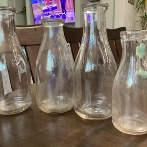 Lotto di 4 bottiglie latte vintage - Foto 1 di 11