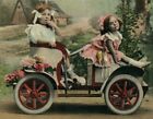 1911 EASTER CAR FLOWER ADORNED CUTE GIRLS TOY MINI AUTOMOBILE CHEERFUL POSTCARD