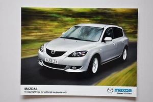 Foto de prensa de coche - Mazda 3 2003 - metálico - vista frontal/lateral - Imagen 1 de 1