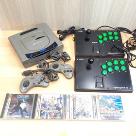 Sega Saturn Console with HORI Fighting Stick 2 controllers & 4 games Japan Gray