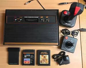ATARI 2600 4-SWITCH WOODY NTSC CONSOLE + ACCESSORIES + 3 GAMES ** FREE POST ** - Picture 1 of 10