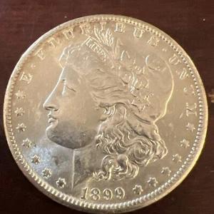 Morgan Silver Dollar 1899 O New Orleans 90% Silver Coin Brilliant Unc. W-91 - Picture 1 of 3