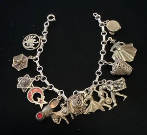 Pulsera vintage de plata de ley con 12 dijes 25,3 gramos - Imagen 1 de 11