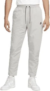 NUEVO CON ETIQUETAS Pantalones Nike Tech Para Hombre Grande Tejido Paquete de Viajeros DQ4343-016 Malla Forrada Gris L - Imagen 1 de 4