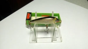 RAPALA, CD VINTAGE=5, PARTE POSTERIOR PLATEADA/NEGRA, NUEVO EN CAJA CON INSERTO (CAJA INCORRECTA) - Imagen 1 de 5