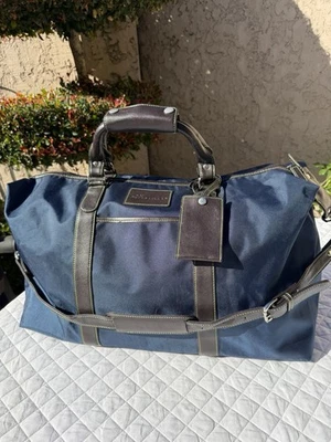 Bolsa de lona Peter Millar Merion Golf Club Weekender marrón chocolate  Foto 1 de 4