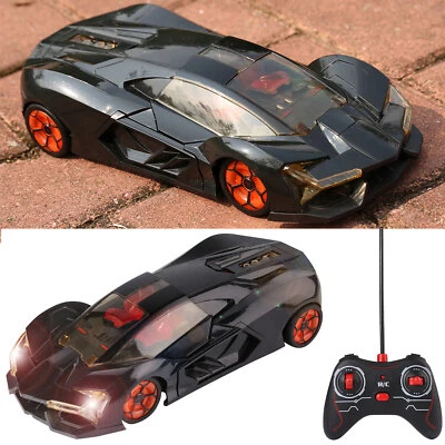 1:12 Kids RC Remote Control High Speed Model Car Toy Vehicle Open Doors Lights  - Image 1 of 4