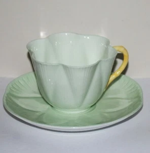 Shelley Dainty Celadon Green Lotus Flower Tea Cup & Saucer Yellow Handle RARE - Picture 1 of 10