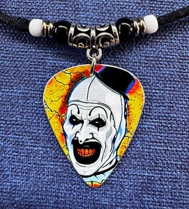 Art The clown Terrifier Aluminum Guitar Pick Necklace - Picture 1 of 3