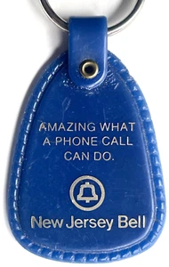 VINTAGE NEW JERSEY BELL TELEPHONE KEY FOB KEY CHAIN "AMAZING WHAT A CALL CAN DO" - Picture 1 of 3