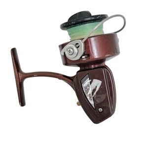 Carrete de pesca giratorio de metal borgoña Olympic Penguin 2020 hecho en Japón funciona - Imagen 1 de 6