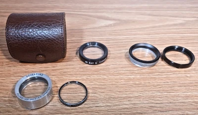 Lens Case with FIVE (5) Filters and Adapters Tiffen Spiratone Spiralite - Image 1 of 4