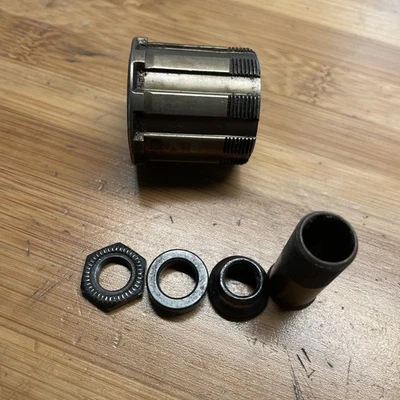 Shimano Uniglide 6-Speed Freehub Body, with cones and mounting bolt.  - Image 1 of 3