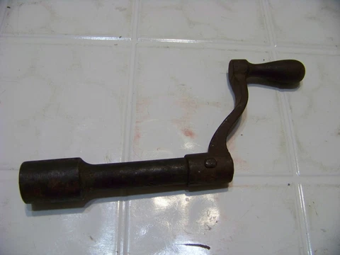 vintage metal crank handle window canopy hardware salvage parts remodel restore Cover