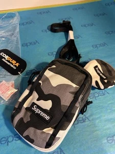 Nueva bolsa para cámara Supreme y mini bolsa camuflaje para nieve SS25 Cordura EDC - Imagen 1 de 3