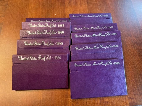 Lot of 10 US Mint Proof sets 1984-1993 in OGP with COA Cover