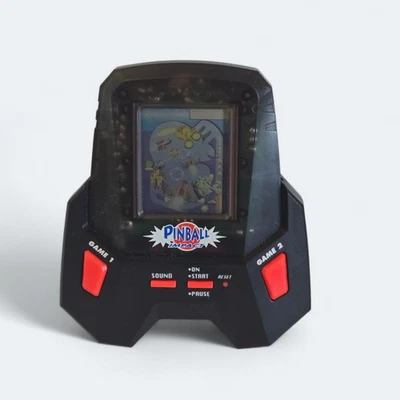 Pinball Impact Handheld LCD Game with Sound & Vibration **WORKS** - Image 1 of 4