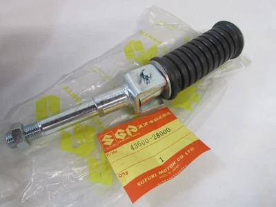 NOS MONTAJE REPOSAPIÉS TRASERO SUZUKI TC100 TC125 1973 - 1977 TC185 43600-28000 Foto 1 de 2