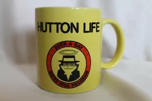 Taza de café amarillo Hutton Life Buck-A-Day I Had A Good Idea programa taza hombre Halo - Imagen 1 de 4