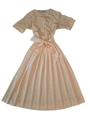 Vestido midi pequeño vintage años 70 Diane Von Furstenberg amarillo plisado abotonado atado Foto 1 de 4