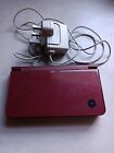 Nintendo DSi XL Console with Nintendo charger and 5 games