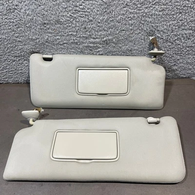 Juego parasol Nissan Armada QX56 2004-2015 PAR BEIGE TOSTADO OEM Foto 1 de 4