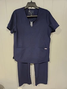 Conjunto combinado de pantalones medianos y top grande Figs Technical Collection azul - Imagen 1 de 13