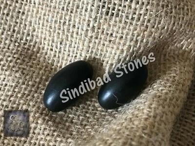 Par de piedras de serpiente negra - حجر الثعبان الاسود - زوج خرزة الحية - للقوة والقيادة Foto 1 de 4