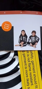 Size 8 Unisex Glow In The Dark Skeleton Pajamas/Costume  New - Picture 1 of 3