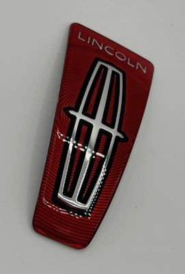 1 Remanufacturado 98-02 Lincoln Continental PLÁSTICO REJILLA RADIADOR emblema rojo Foto 1 de 4