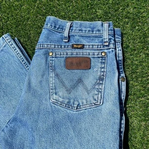 Pantalones de mezclilla vintage con parche de cuero Wrangler talla 33 x 30 - Imagen 1 de 8