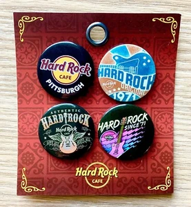 JUEGO DE 4 BOTONES HARD ROCK CAFÉ PITTSBURGH HR MARKETING LOGOTIPO CLÁSICO Y GUITARRAS - Imagen 1 de 2