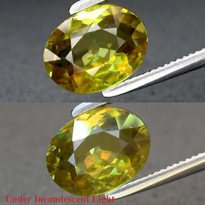 1.03ct 7.7x5.8mm VS Oval Natural Yellowish Green Sphene Gemstone, Amazing Luster - Picture 1 of 6