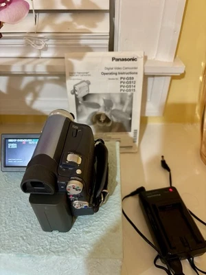 Panasonic PV-GS12 Digital Video Camcorder With Charger/OEM Battery, Works great - Image 1 of 4