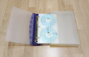 DVD CD KEEPER – Translucent Ring Binder BOX SET HOLDS 40 DISCS RANDOM COLOR-BST - Afbeelding 1 van 11