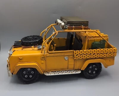  1:18 Safari Truck Jeep Land Rover Yellow Metal Tin Decor Model  - Image 1 of 4
