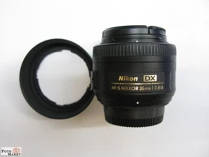 Nikon AF-S DX Nikkor 35mm 1:1,8 G Objektiv + HB-46 f. SLR-Kamera mit DX-Sensor - Bild 1 von 4